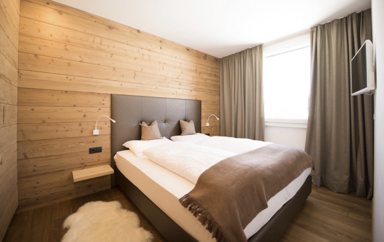 La camera da letto in uno chalet rustico e romantico sull'Alpe di Siusi